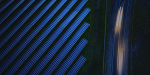 Aerial photo of solar panels, illustrating infrastructure investment in renewable energy